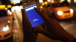 A prospective Uber user opens the companys app on a smartphone