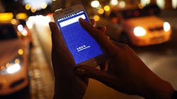 A prospective Uber user opens the companys app on a smartphone A prospective Uber user opens the companys app on a smartphone