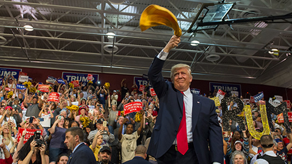 Thennominee Donald Trump waves a Terrible Towel at a Pennsylvania rally