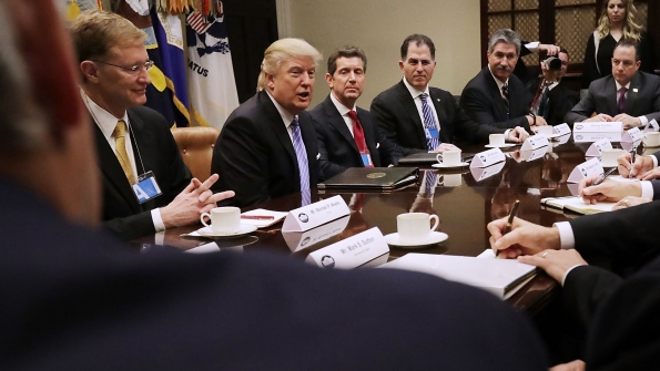 President Donald Trump and various manufacturing CEOs