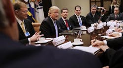 President Donald Trump is flanked by, from left, Wendell Weeks of Corning, Alex Gorsky of Johnson &amp; Johnson, Michael Dell of Dell Technologies, and Mario Longhi of U.S. Steel, during a meeting Monday in the White House.