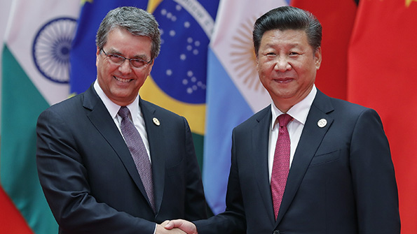 WTO directorgeneral Roberto Azevedo and Chinese president Xi Jinping