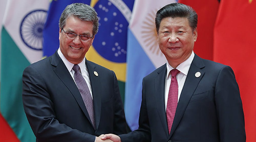 World Trade Organization director-general Roberto Azevedo, left, shakes hands with Chinese president Xi Jinping at the G20 Summit last fall in Hangzhou, China.