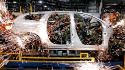 A vehicle is welded at the GM Lansing Delta Township Assembly plant A vehicle is welded at the GM Lansing Delta Township Assembly plant