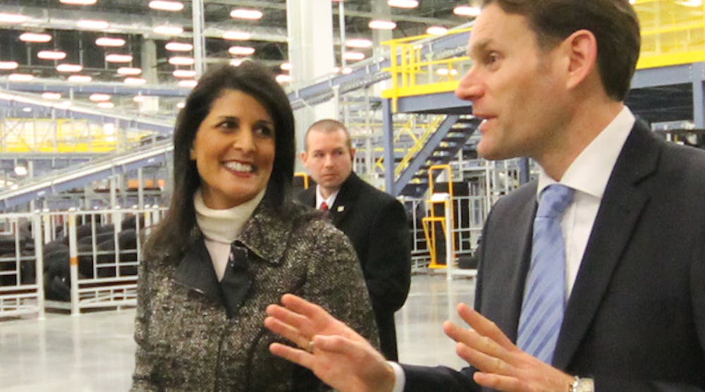South Carolina Governor Nikki Haley and Continental Executive Board Member Nikolai Setzler tour the Continental Tire plant.