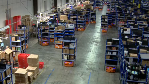 Amazon Robotics cobots once Kiva Systems move autonomously around a warehouse