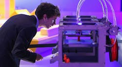 A technician checks on a 3D printer at the Science Museum in London A technician checks on a 3D printer at the Science Museum in London