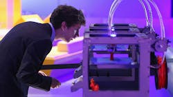 A technician checks on a 3D printer at the Science Museum in London A technician checks on a 3D printer at the Science Museum in London