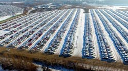 Aerial view of thousands of new cars lining up at a parking lot on January 16, 2017, in Shenyang, Liaoning Province of China.