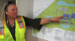 woman showing map at volvo plant