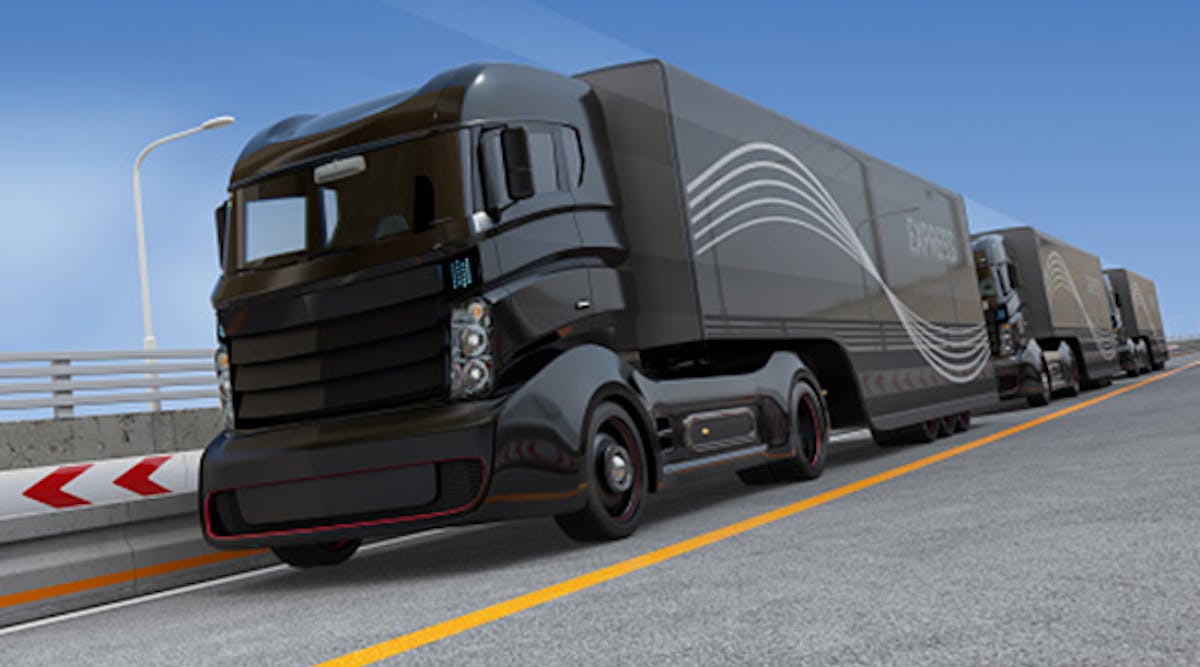 Fleet of autonomous hybrid trucks driving on highway. (Thinkstock)