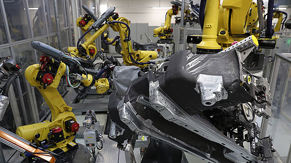 robots welding at VW factory
