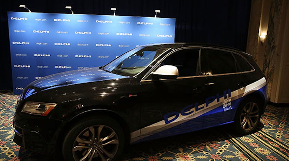 The driverless, specially outfitted Audi Q5 sport-utility vehicle is displayed at the Waldorf Astoria following the car&apos;s return from a cross country trip. Delphi Automotive Plc, a supplier of car electronics, designed the car which covered about 3,500 miles from San Francisco to the New York City area. The car was driverless for all but about 50 miles in a construction zone.