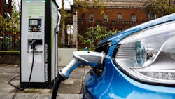 electric car at charging station electric car at charging station