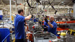 men in factory setting