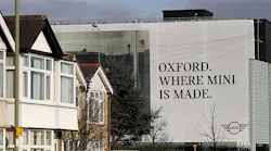 Sign on BMW Mini plant in Oxford, England