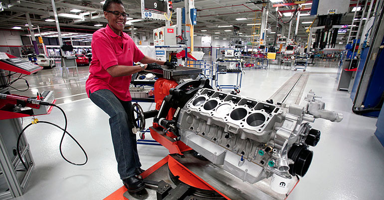 woman handling a car engine