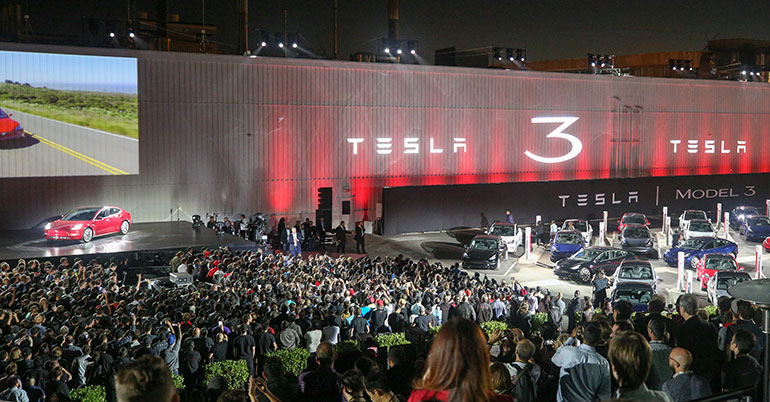 Big crowd at Tesla event for Model 3 deliveries
