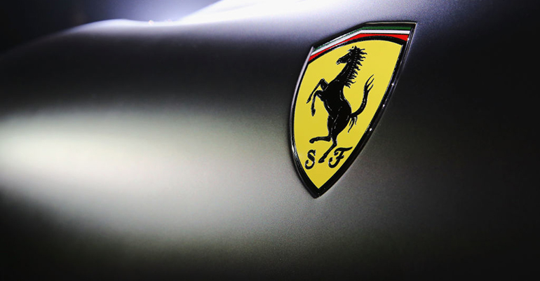 Ferrari logo against black background