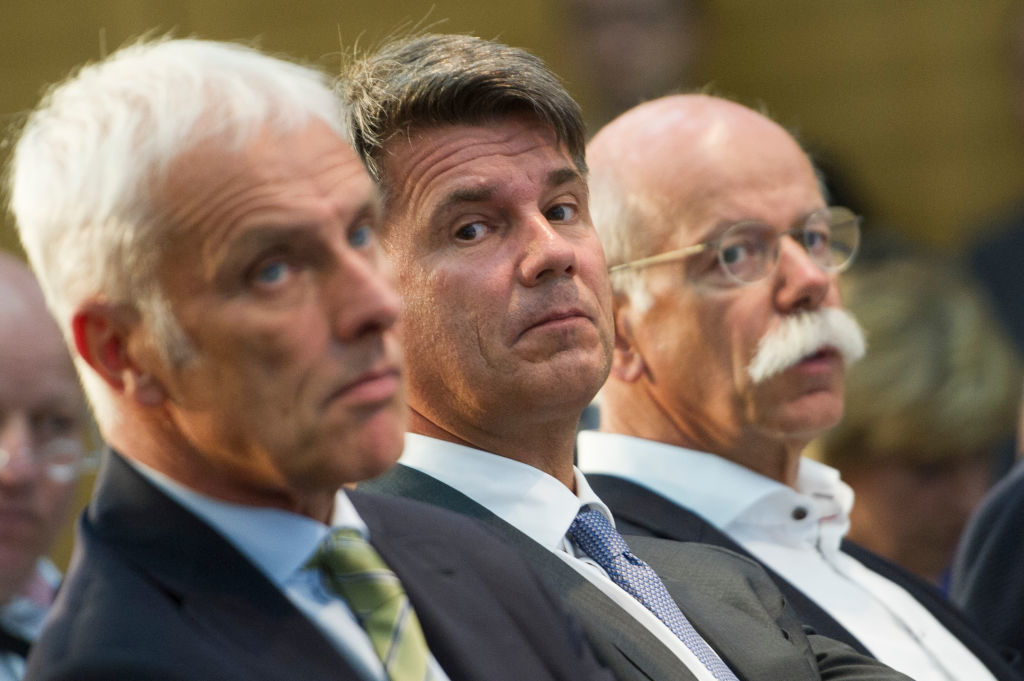 VW chairman Matthias Mueller, BMW CEO Harald Krueger and Daimler AG chair Dieter Zetsche.