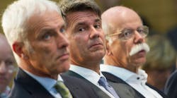 VW chairman Matthias Mueller, BMW CEO Harald Krueger and Daimler AG chair Dieter Zetsche speak at a news conference following the Diesel Conference in Berlin.
