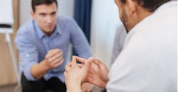 Supervisor speaking with employee Supervisor speaking with employee