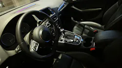 The interior of an Audi Q5 SUV following the car's return from a 3,500-mile cross-country trip, a first for a driverless vehicle. Auto supplier Delphi Automotive Plc designed the car.