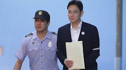 Lee Jae-Yong, vice chairman of Samsung Electronics Co., leave after his verdict trial August 25, 2017, in Seoul, South Korea.