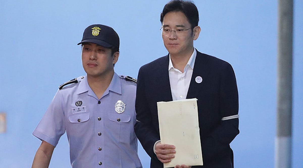 Lee Jae-Yong, vice chairman of Samsung Electronics Co., leave after his verdict trial August 25, 2017, in Seoul, South Korea.