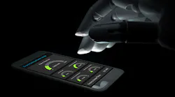 A robotic hand operates a device connected to the IoT.
