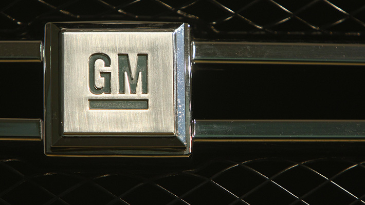 The General Motors logo on a car grille.