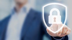 A man in a sportcoat holds up his finger to press a superimposed image of a lock in a shield. A man in a sportcoat holds up his finger to press a superimposed image of a lock in a shield.