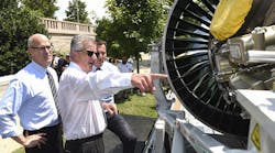 Pratt &amp; Whitney President Bob Leduc, center, describes the workings of the Geared Turbofan engine to Rep. Thomas Suozzi, D-N.Y., right, and Rep. Rick Larsen, D-Wash., left, during an event on Capitol Hill, Wednesday, July 19, 2017 in Washington. The engine, with more than 8,000 on order, will help drive hiring up to 25,000 new employees, at Pratt &amp; Whitney though 2026, and was showcased as an example of U.S. manufacturing leadership.