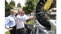 Pratt &amp; Whitney President Bob Leduc, center, describes the workings of the Geared Turbofan engine to Rep. Thomas Suozzi, D-N.Y., right, and Rep. Rick Larsen, D-Wash., left, during an event on Capitol Hill, Wednesday, July 19, 2017 in Washington. The engine, with more than 8,000 on order, will help drive hiring up to 25,000 new employees, at Pratt &amp; Whitney though 2026, and was showcased as an example of U.S. manufacturing leadership.