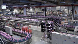 Six-packs of bottled water run along the lines at an Evian plant in France. Six-packs of bottled water run along the lines at an Evian plant in France.
