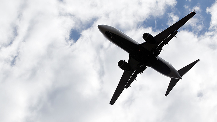 An airplane flies over Raleigh, N.C.