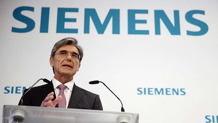 Siemens CEO Joe Kaeser speaks at a news conference.