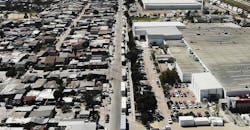 Trucks lined up at Mexico border in Tijuana. Trucks lined up at Mexico border in Tijuana.