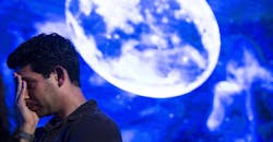 Disappointed man after spacecraft fails to land on the moon. Disappointed man after spacecraft fails to land on the moon.