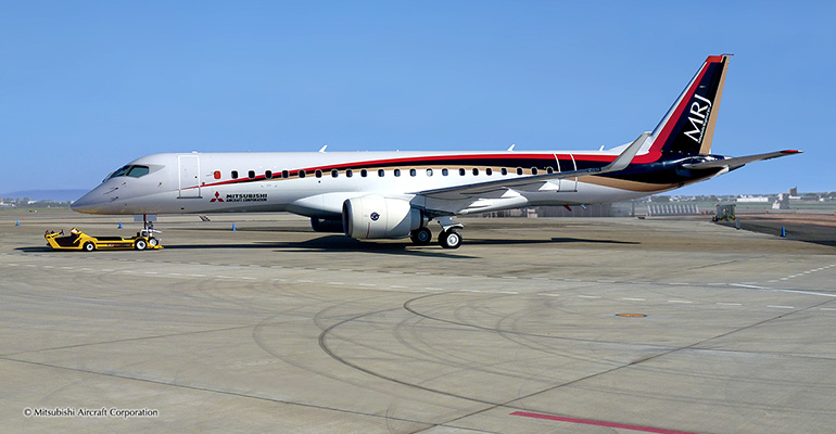 Mitsubishi regional jet on runway