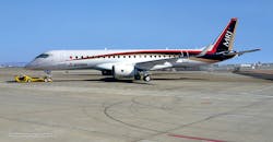 Mitsubishi regional jet on runway Mitsubishi regional jet on runway