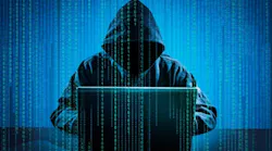 hacker messing around with a computer