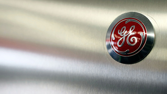 The GE logo on an appliance.