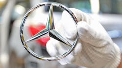 A Mercedes-Benz hood ornament. A Mercedes-Benz hood ornament.