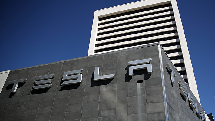 The front of a Tesla building.