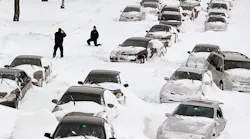 Rows of cars are stalled on Lake Shore Drive during a Chicago blizzard.