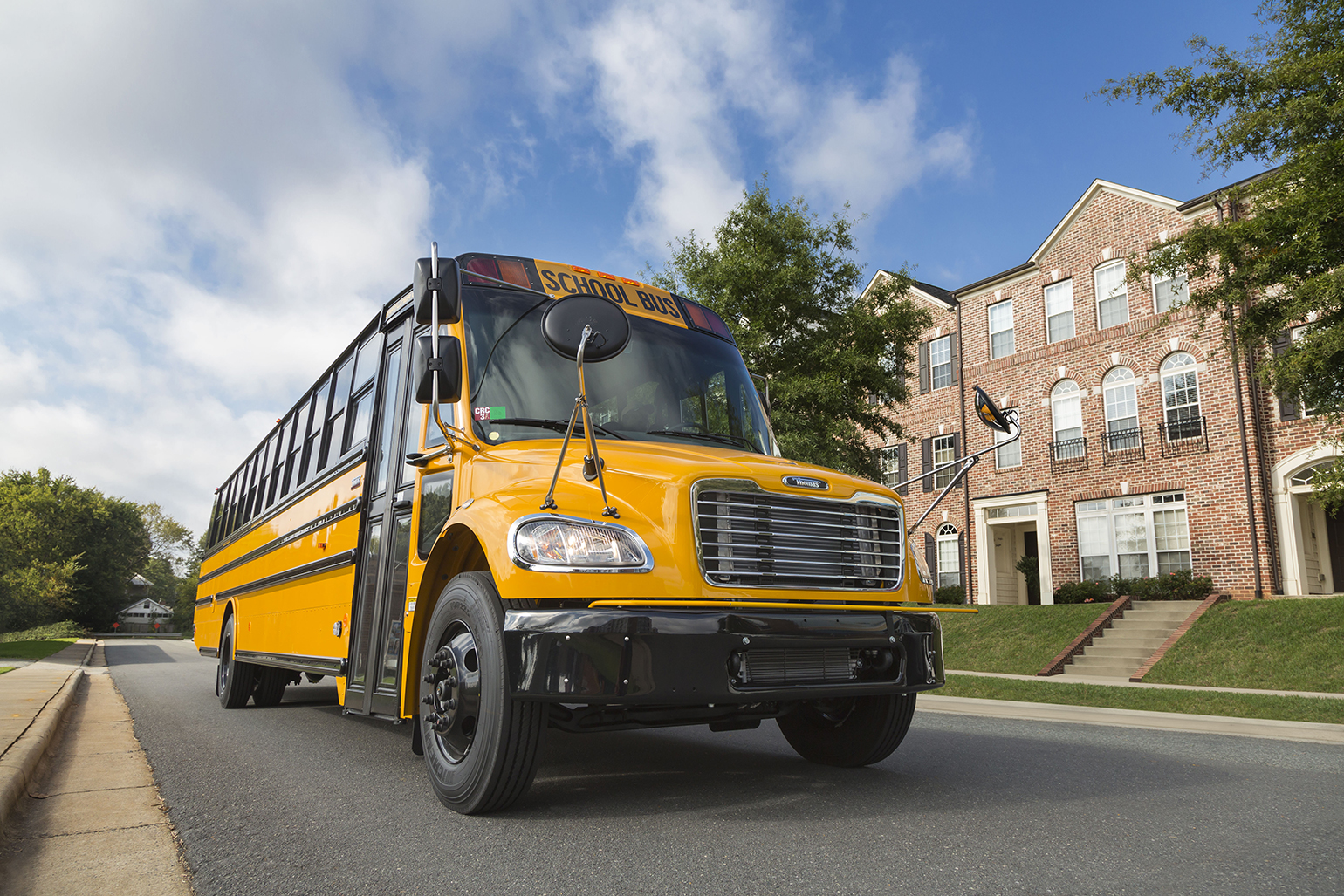 Thomas Built Bus on street