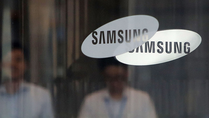 The Samsung logo and wordmark on doors at the company's headquarters.