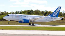 A Bombardier C series plane takes off on a runway.