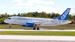 A Bombardier C series plane takes off on a runway. A Bombardier C series plane takes off on a runway.